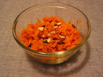 Grated carrot with raisins and chopped almonds