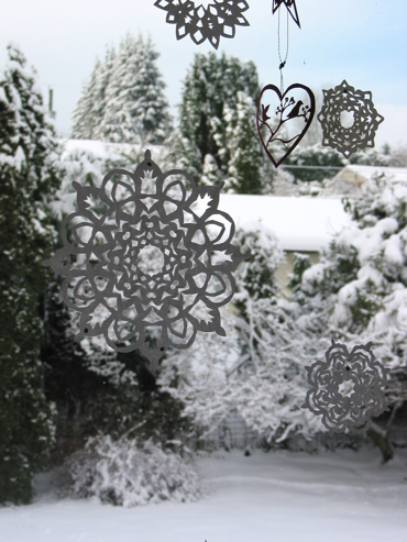 Decorations in window with snow